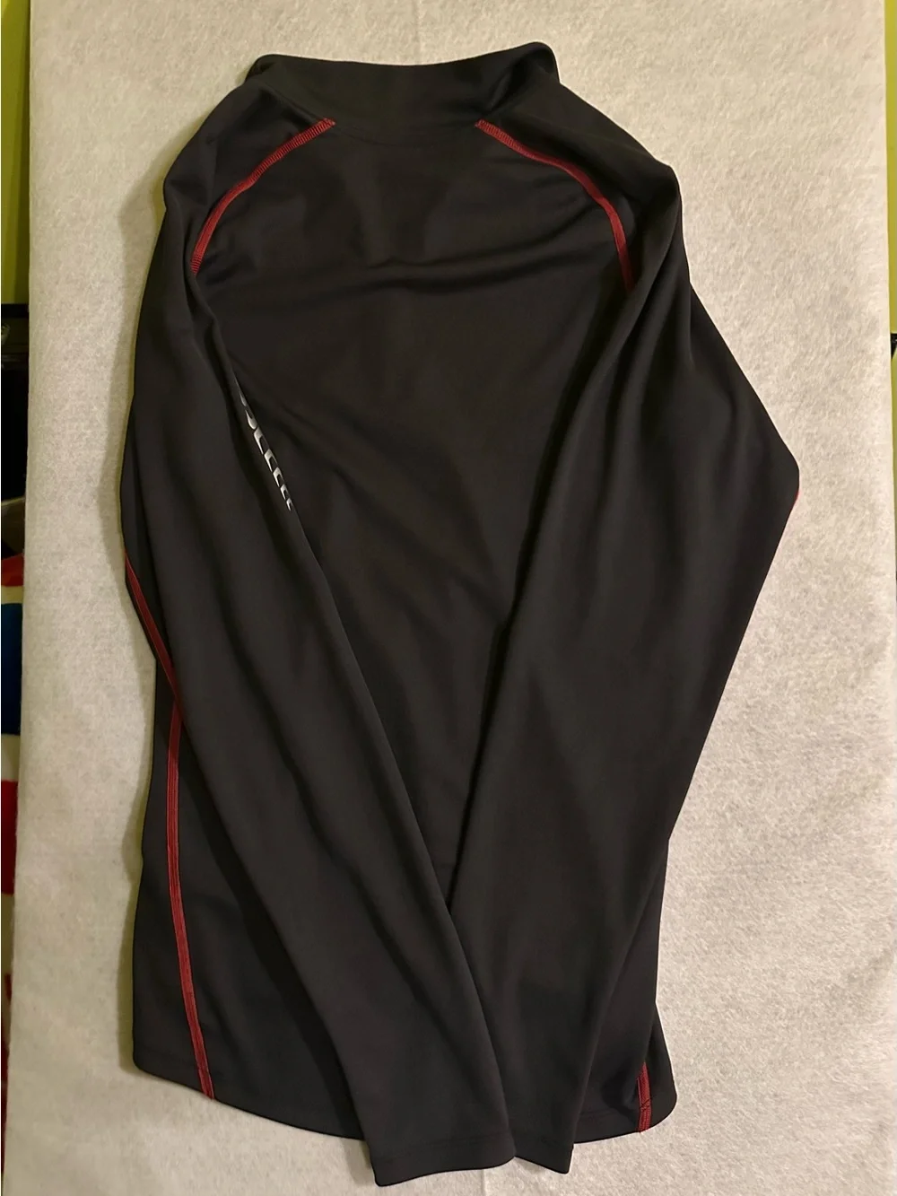 The North Face Men’s Black Half-Zip Performance Jacket with Red Accents